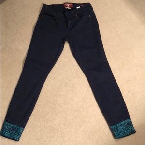 Slacks with ankle detail